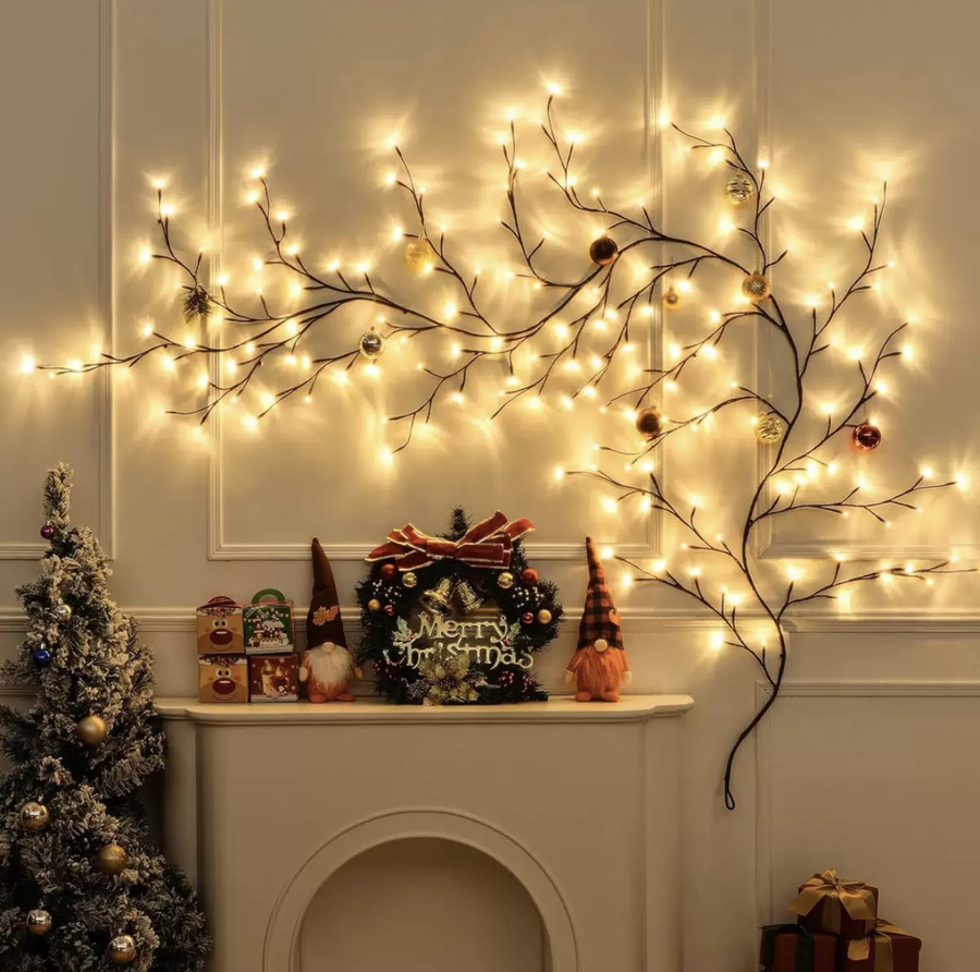 The BranchGlow Vine over a headboard